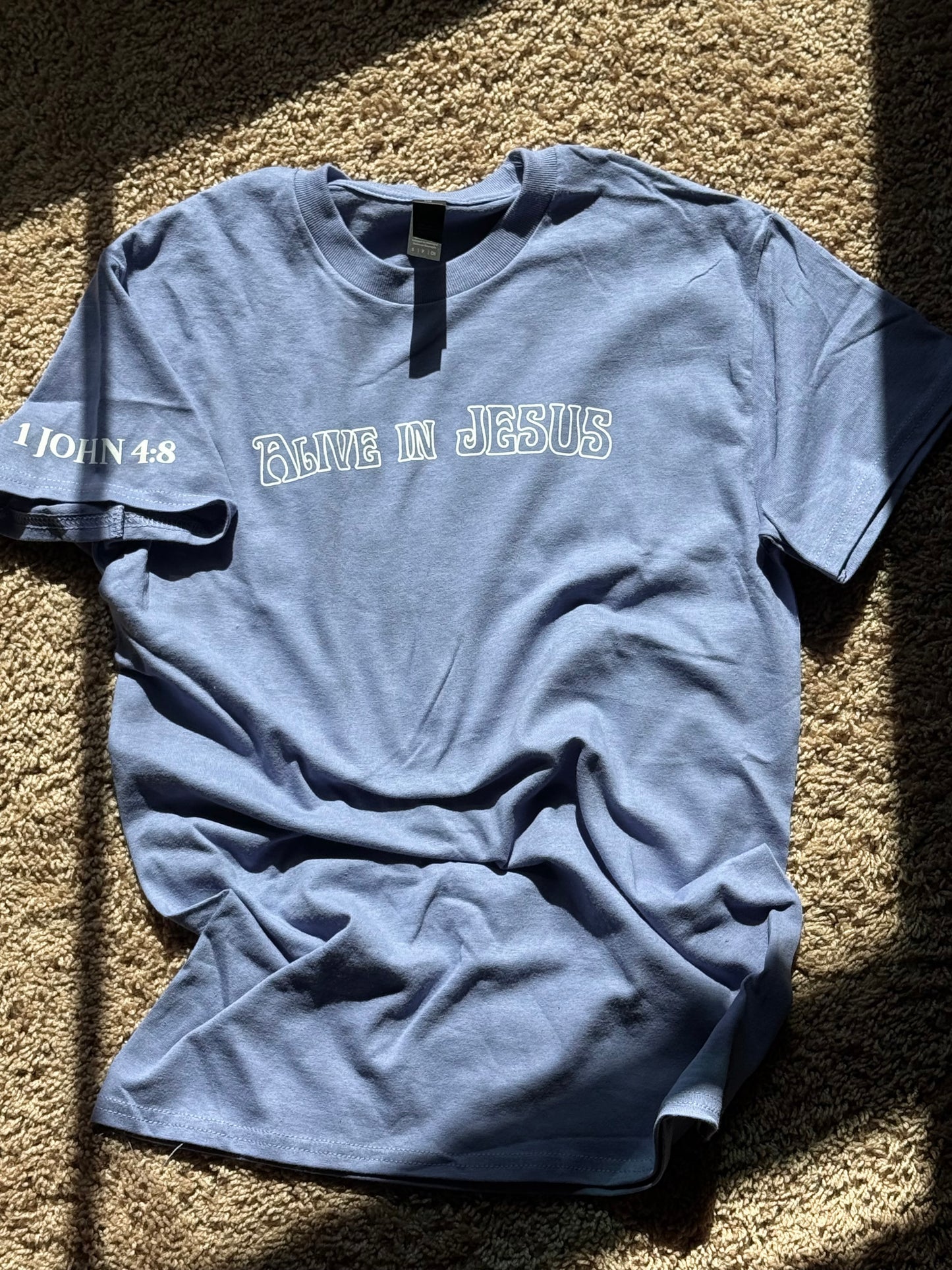 Alive in Jesus purple t shirt